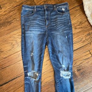 Blue jeans, with holes